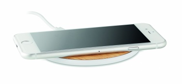 Logo trade reklaamkingitused foto: Juhtmeta laadija ümmargune 5W TISPAD